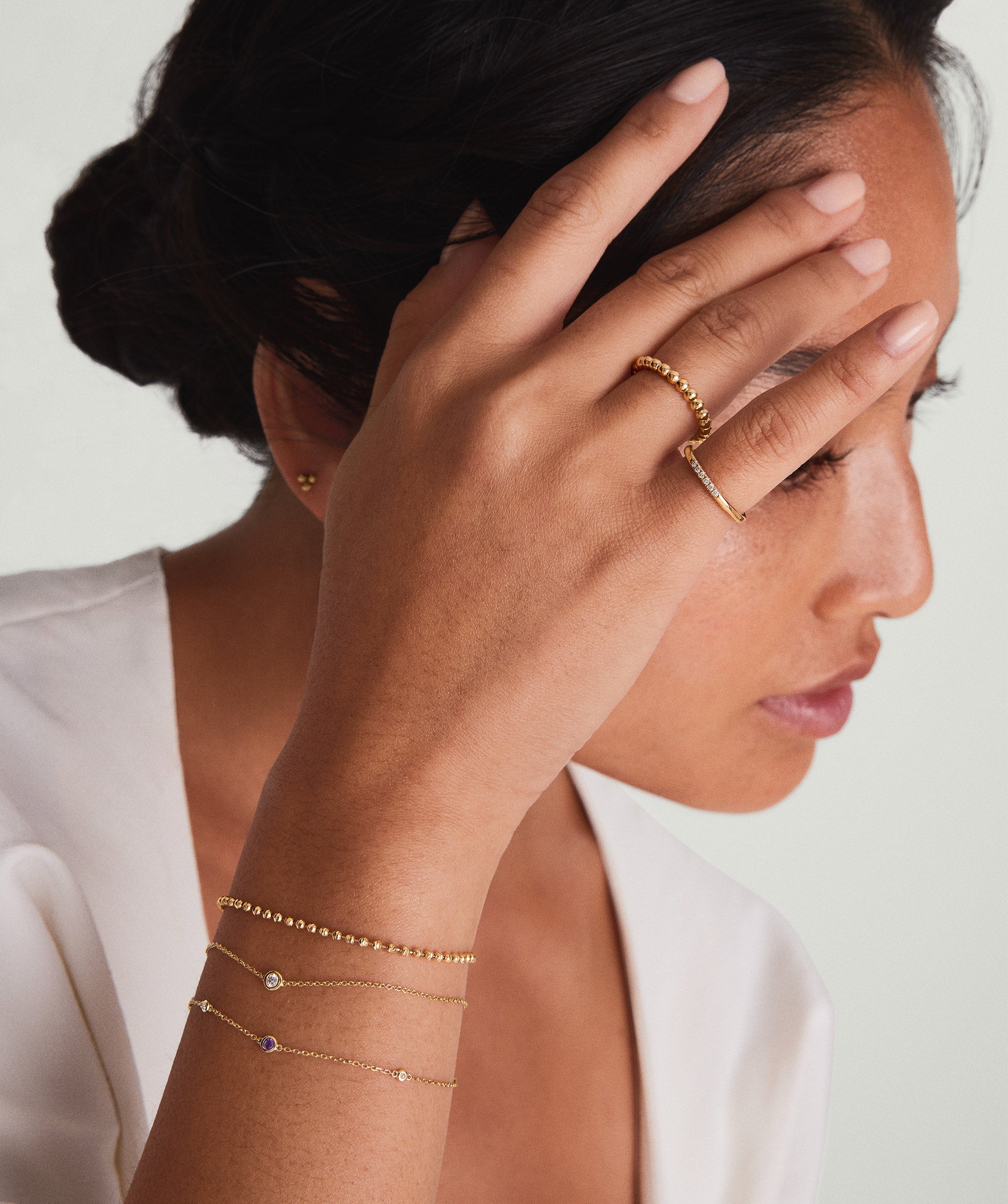 1-BIRTHSTONEBRACELETS_BirthstoneBraceletFebruaryAmethyst_14k_Stack_014_5b3f77b8-33f0-4642-b714-ca12752b0ce4