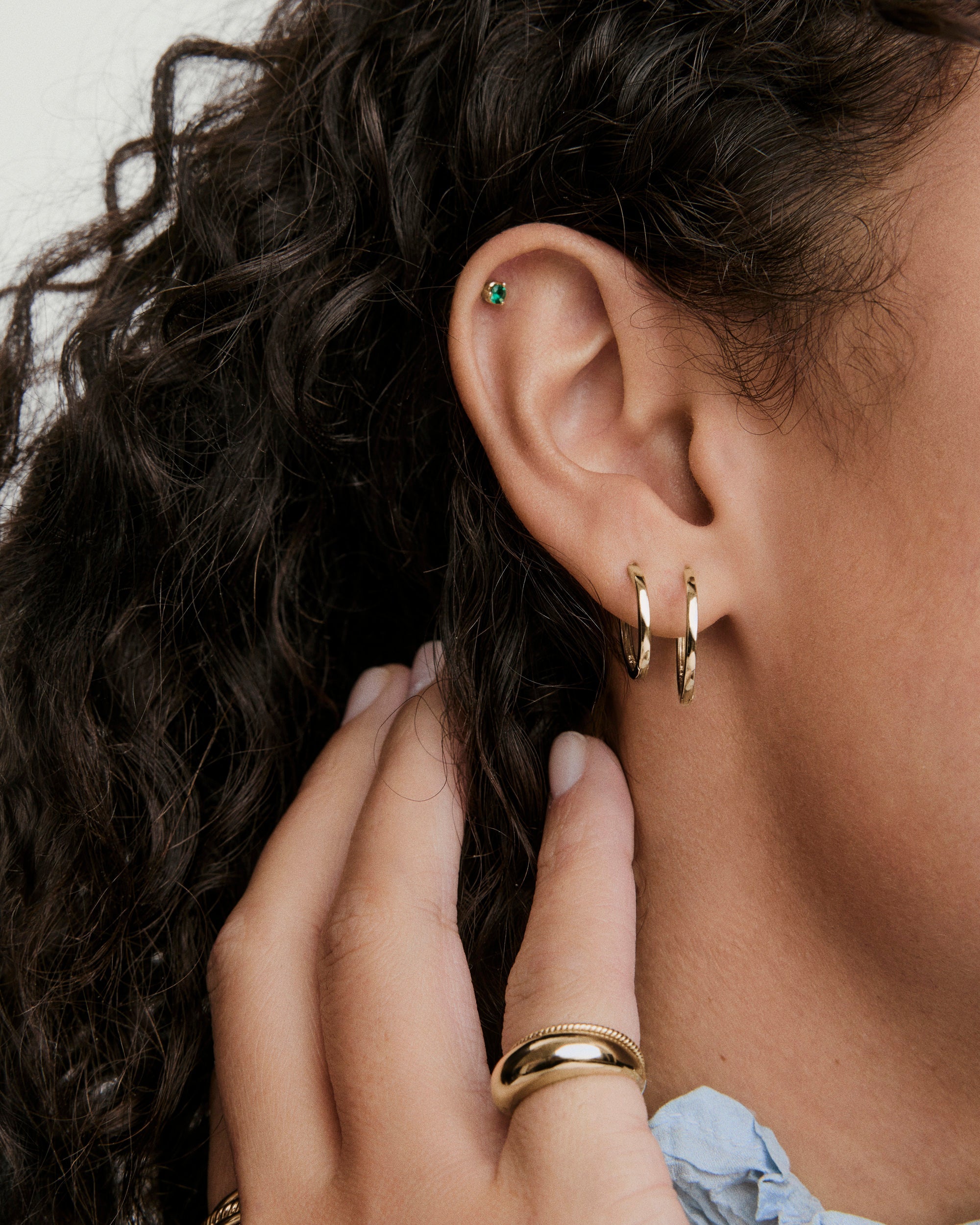 1-BirthstonePiercingStuds_BirthstonePiercingStudMayEmeraldLAB_YG_Stack_014