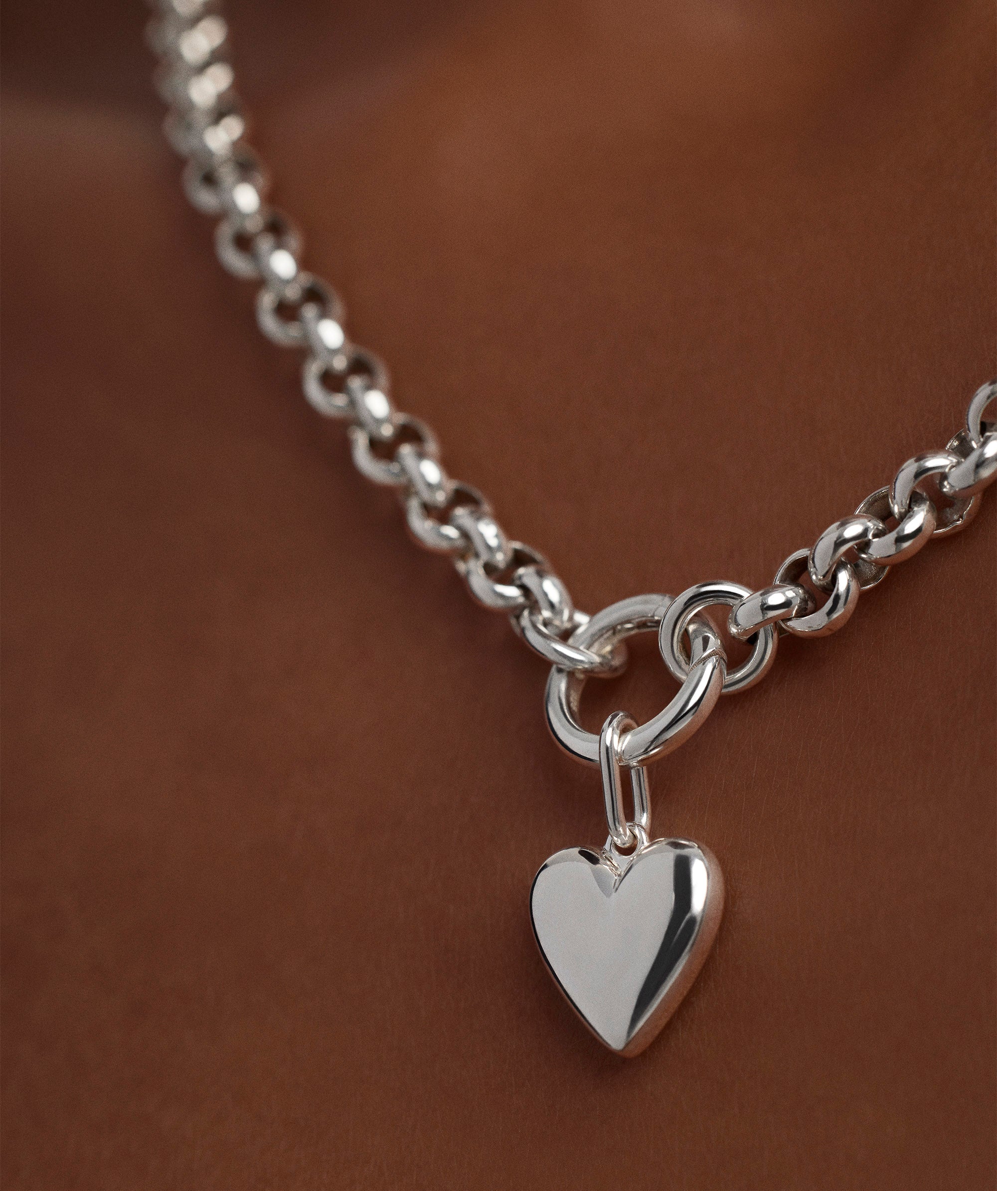 1-CHAINSCHARMSFUNCTIONALELEMENTS-PuffyHeartCharmSilver-SS-Stack_047_1546cc3b-9a71-4569-a3c8-2b7ecb670203