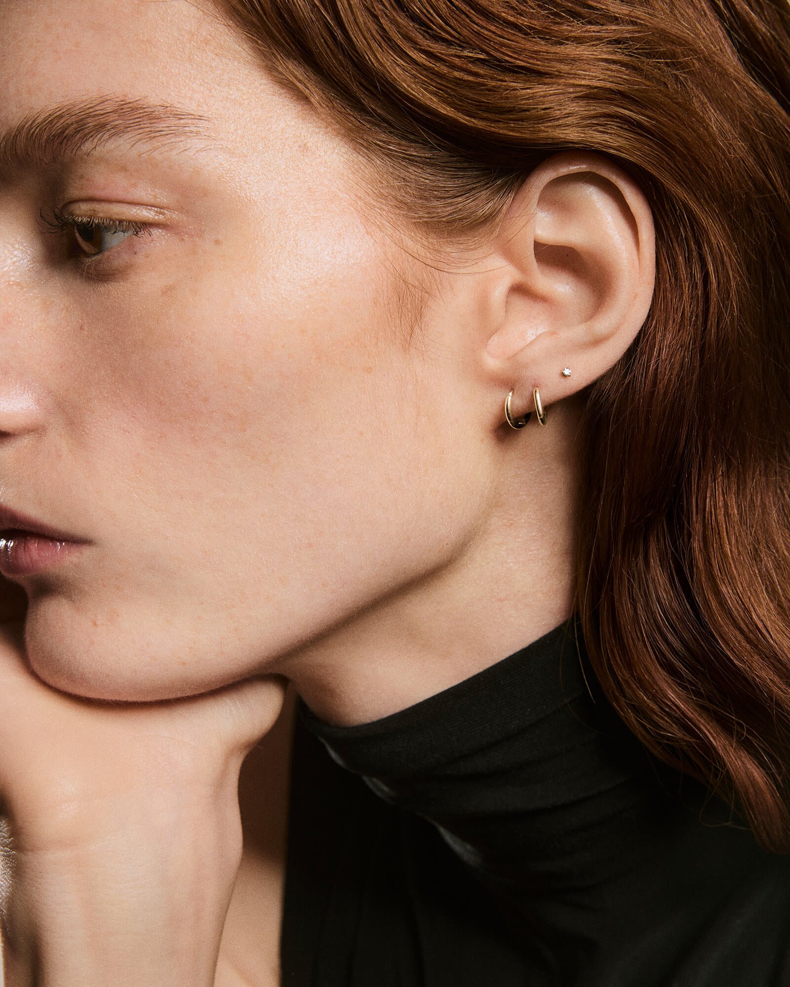 3-EarStylingStudRefresh_PiercingStudio_TinyProngDiamondStud_YG_OnFigStacked_028_4f6fd438-749e-43a9-a27d-de22f1ff269b-1