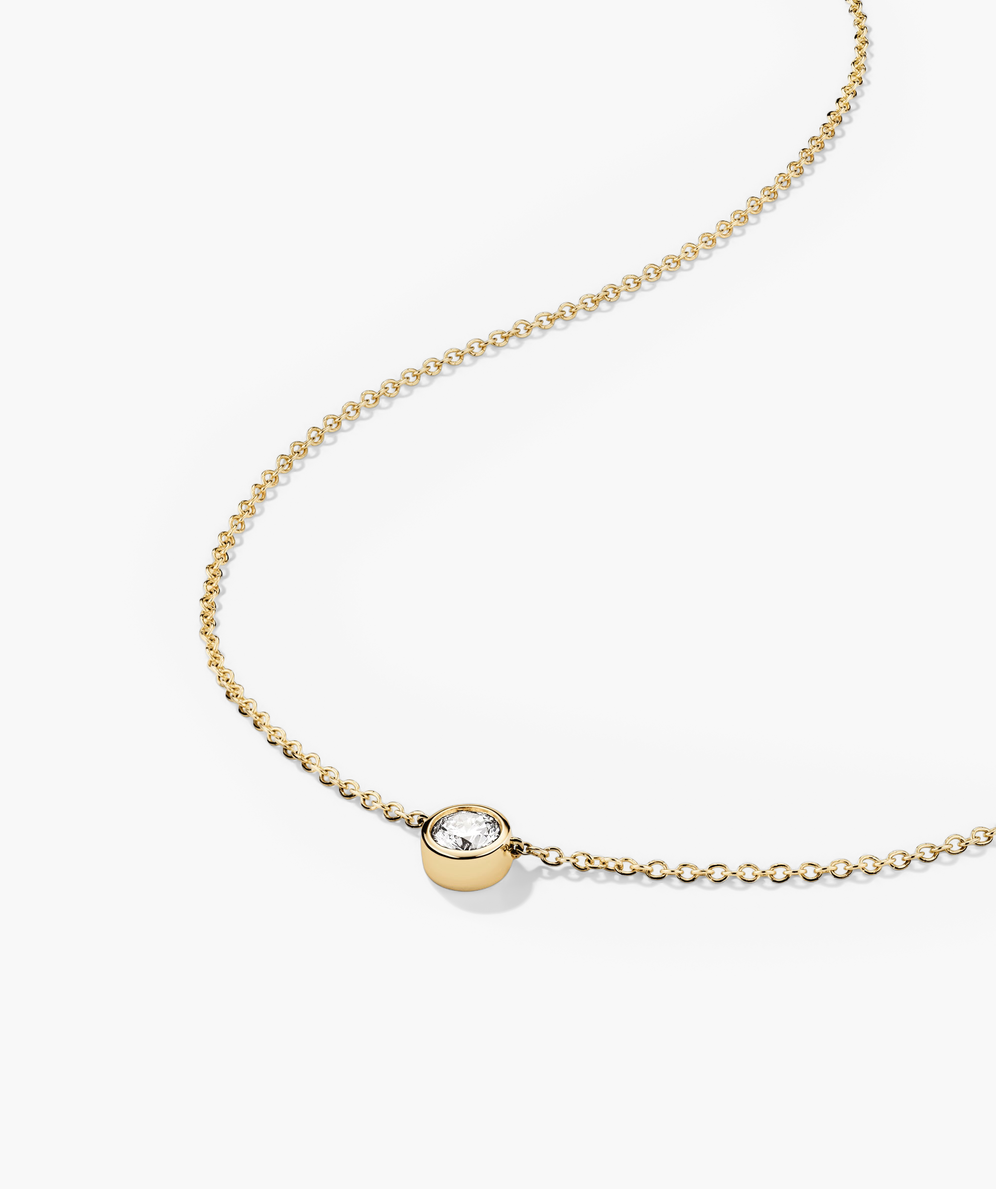 3-LABGROWNDIAMONDSBEZEL-LGD0.5ctDiamondNecklace-YG-FlatLay_231_new_581bb36f-f323-48ff-80f5-8076ae235c08